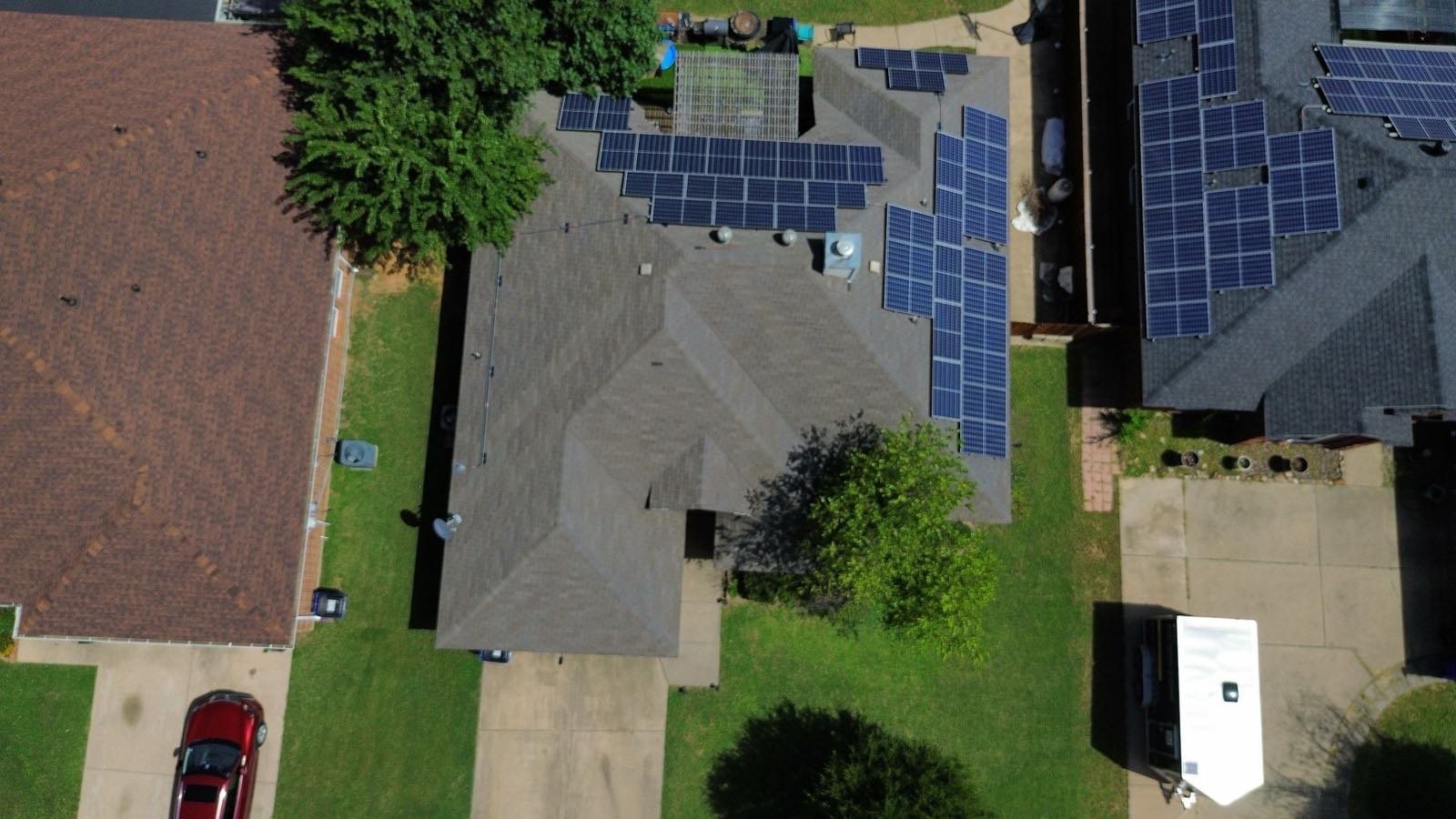 Aerial view of a shingle roof during a drone inspection