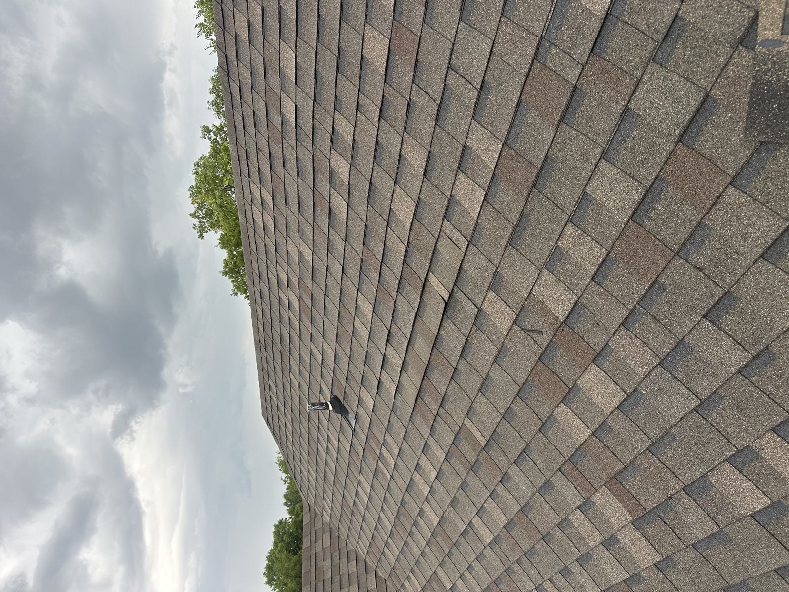 Long shingle slope photographed under overcast light