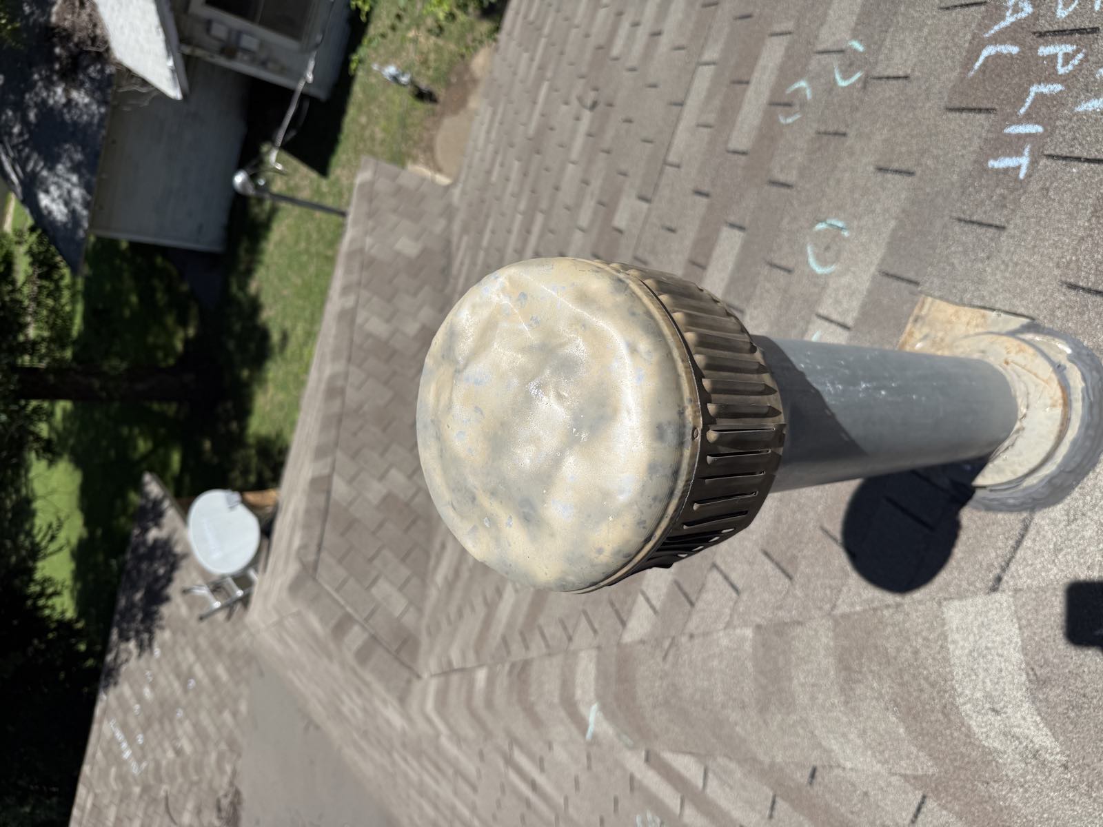 Plumbing vent cap dented and weathered by hail