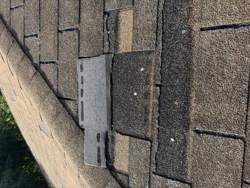 Flashing section lifted with fasteners left proud